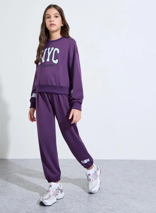 Styli Teen Girls Purple Graphic Print Sweatshirt and Joggers Set