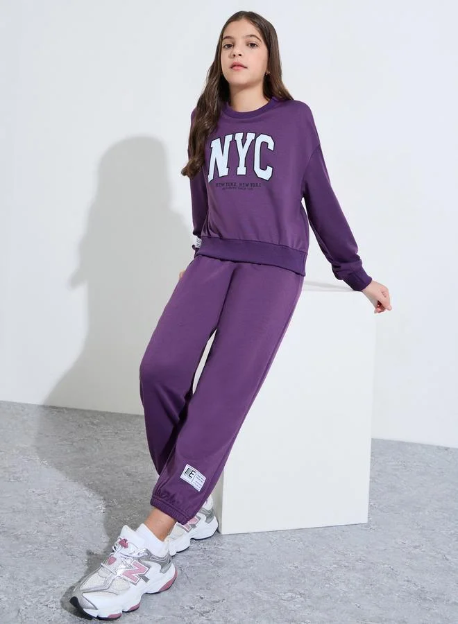 Styli Teen Girls Purple Graphic Print Sweatshirt and Joggers Set