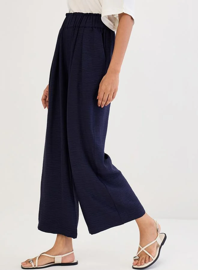 Femmella  Navy Blue Wide Leg Pleat Detail Pants for Women | Best Price UAE