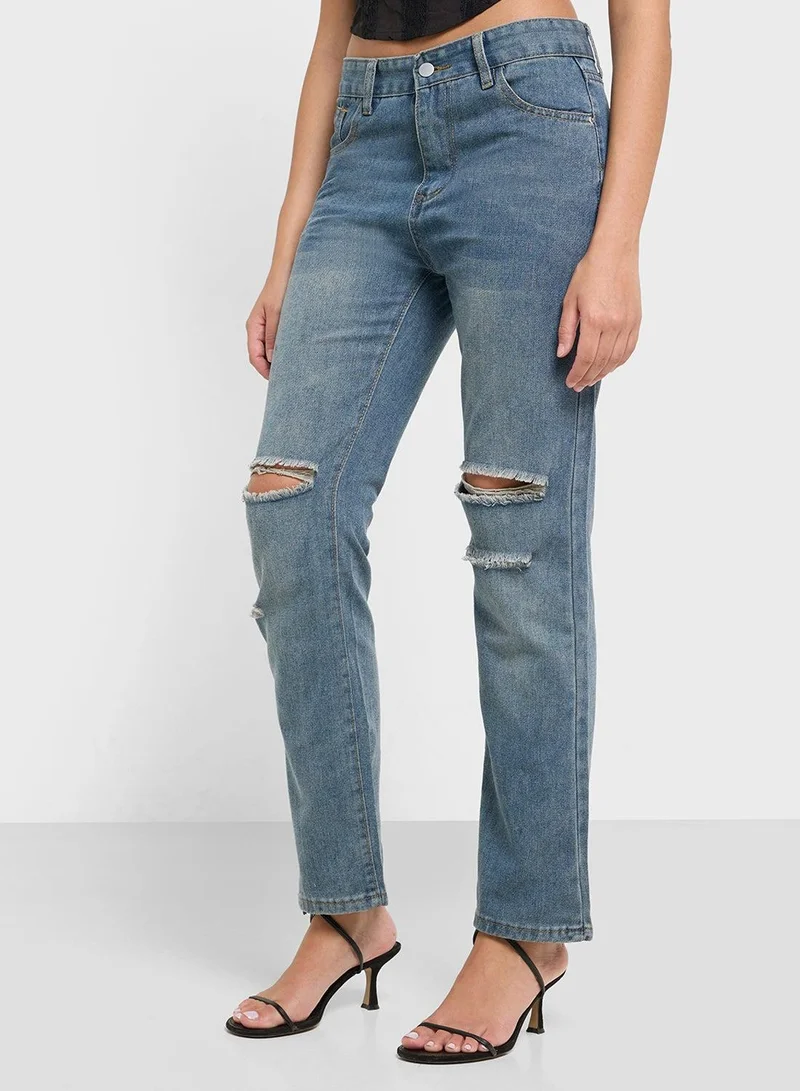 High Rise Relaxed Fit Ripped Jeans
