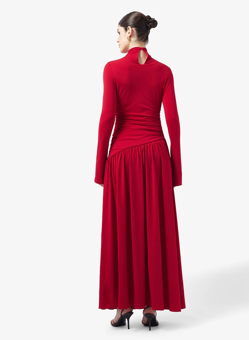 بريتي لافيش فستان ماكسي من جيرسي بشراشيب شاي