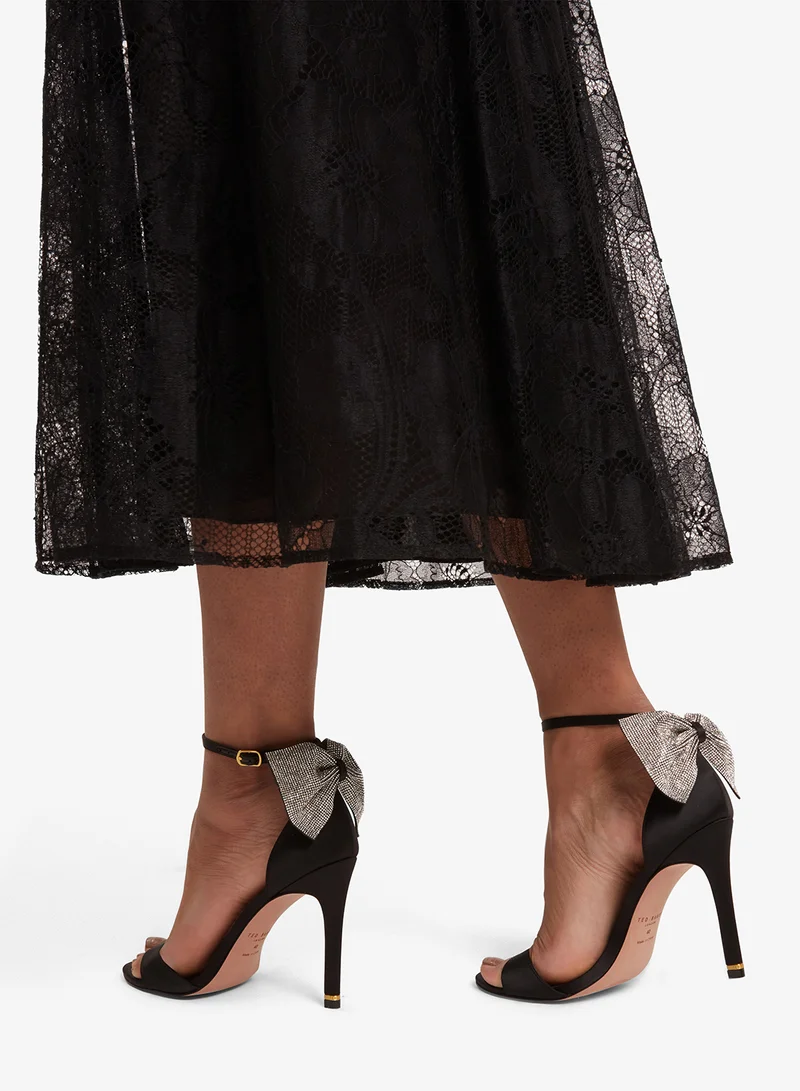 تيد بيكر صنادل كريسي بكعب وحزام للكاحل