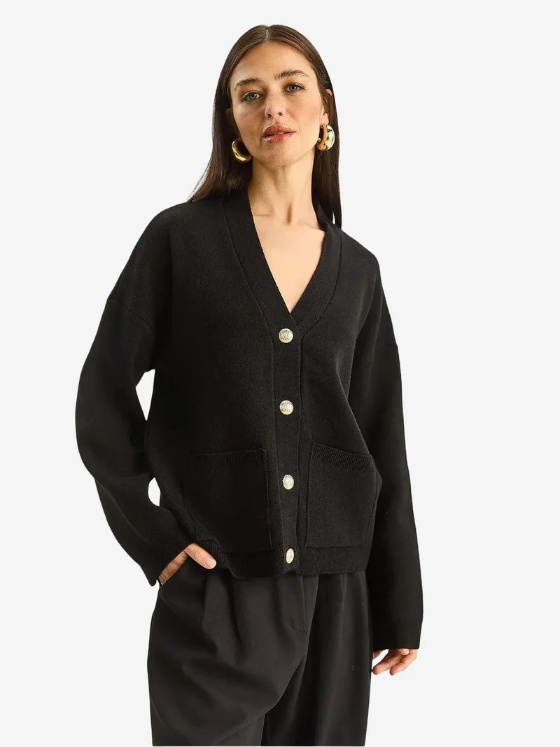 بيانكو لوتشي كارديجان برقبة على شكل حرف  وضلع سميك بأزرار من لوتشي