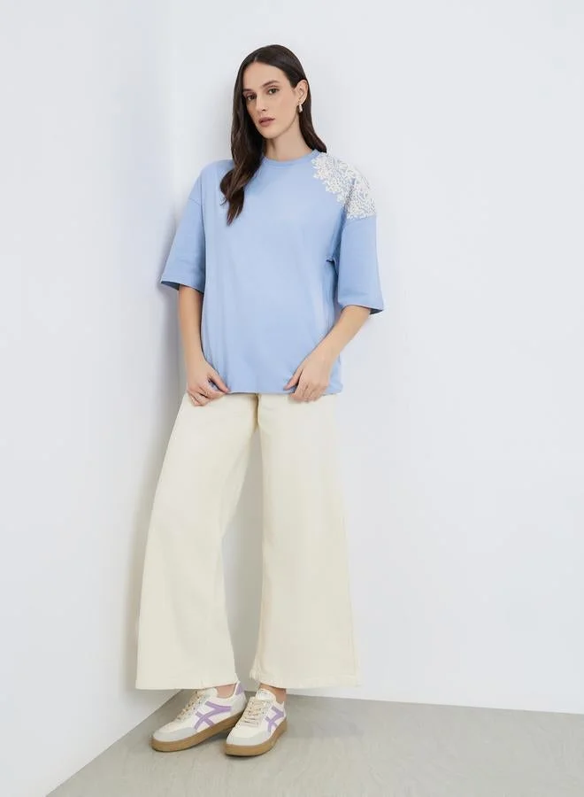 Styli Women Light Blue Placement Flocked Oversized T-Shirt