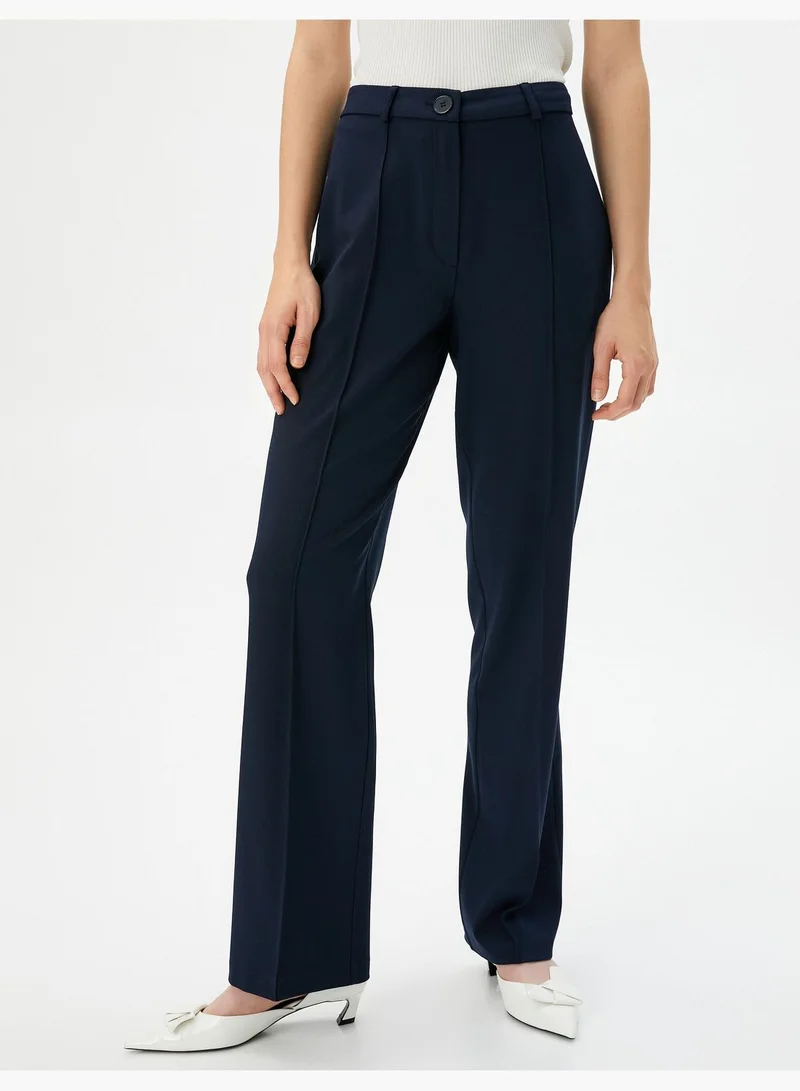 KOTON Medium Rise Buttoned Staright Leg Trousers