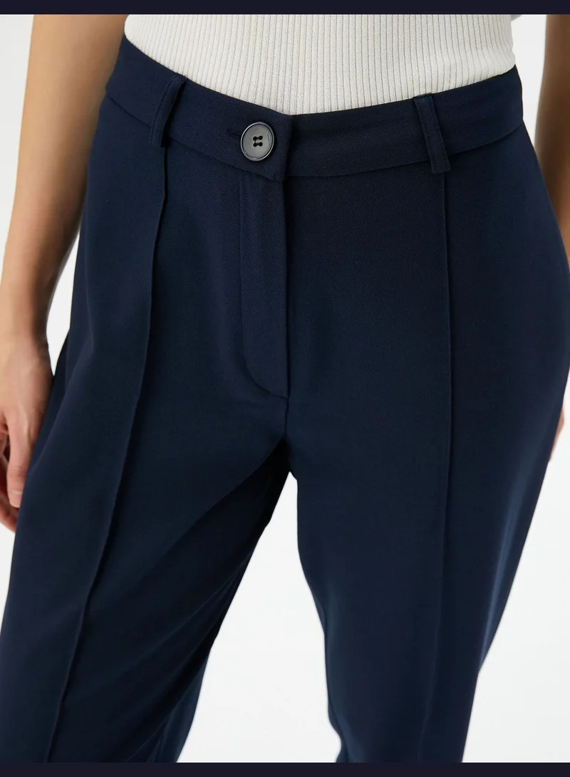 KOTON Medium Rise Buttoned Staright Leg Trousers