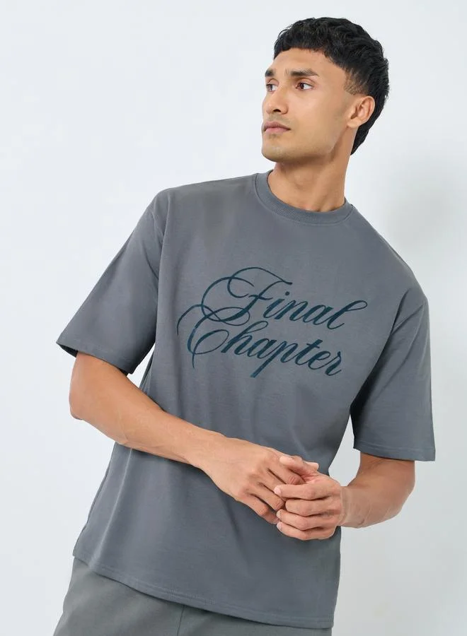 Styli Styli Men Grey Oversized Flock Chest Print T-Shirt