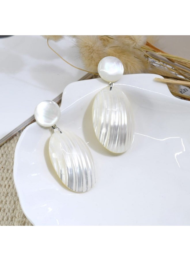 AeraVida Brilliant White Oval Shaped Mother Of Pearl Shell Post Drop Dangle Earrings | Beach Bridal Wedding Accessories | Fashion Jewelry  - Image 3