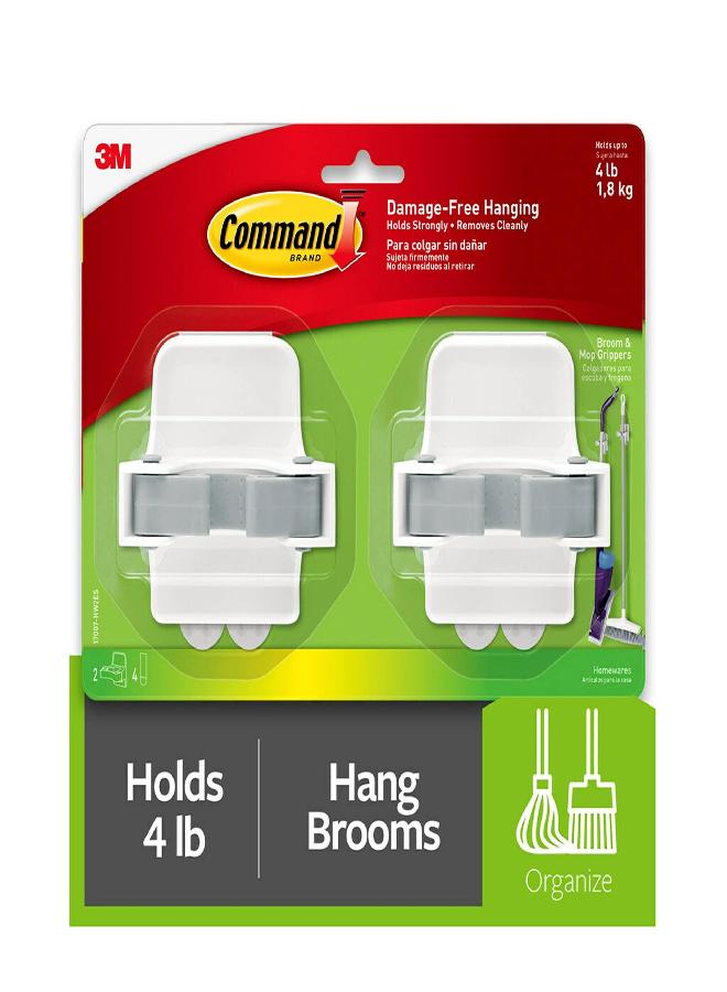 Command Broom and Mop Grippers, 2 Hangers and 4 Command Strips, Damage-Free Hanging Wall Mount Broom and Mop Holder, Household Cleaning Organizer for Organization and Storage, Holds up to 4 lb - Image 1