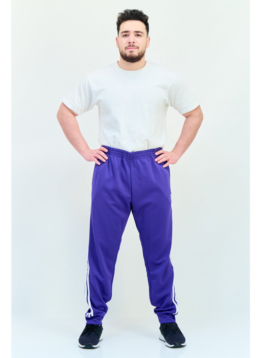 adidas Originals - Men Slim Fit Brand Logo Outdoor Track Pants, Energy Ink - Image 1