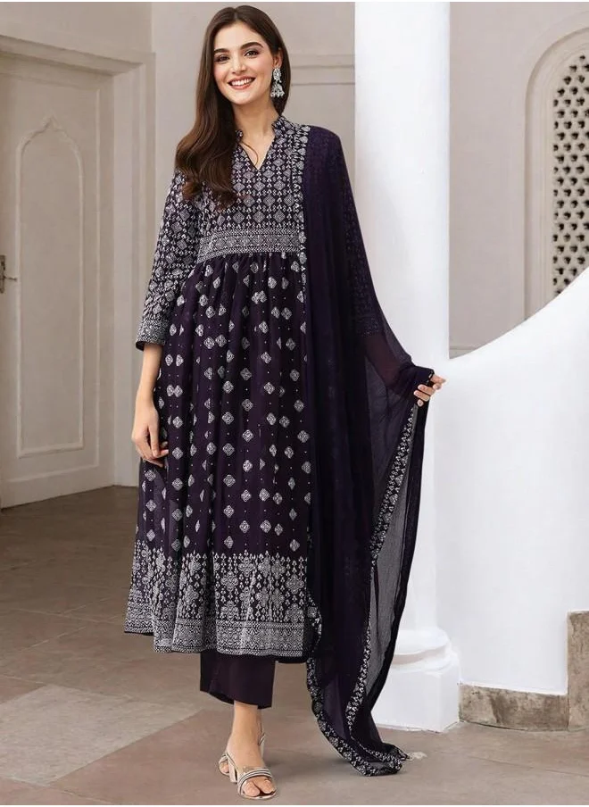 ISHIN Straight Fit Women Purple Georgette Kurta Set with Embroidered pattern Tunic and Palazzo features a Round neckline and Three-Fourth Sleeve secured with Elastic closure and styled in Straight Fit ideal for Festive moments — a must-have for your statement wardrobe.