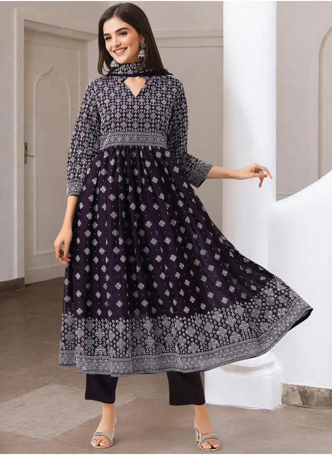 ISHIN Straight Fit Women Purple Georgette Kurta Set with Embroidered pattern Tunic and Palazzo features a Round neckline and Three-Fourth Sleeve secured with Elastic closure and styled in Straight Fit ideal for Festive moments — a must-have for your statement wardrobe.