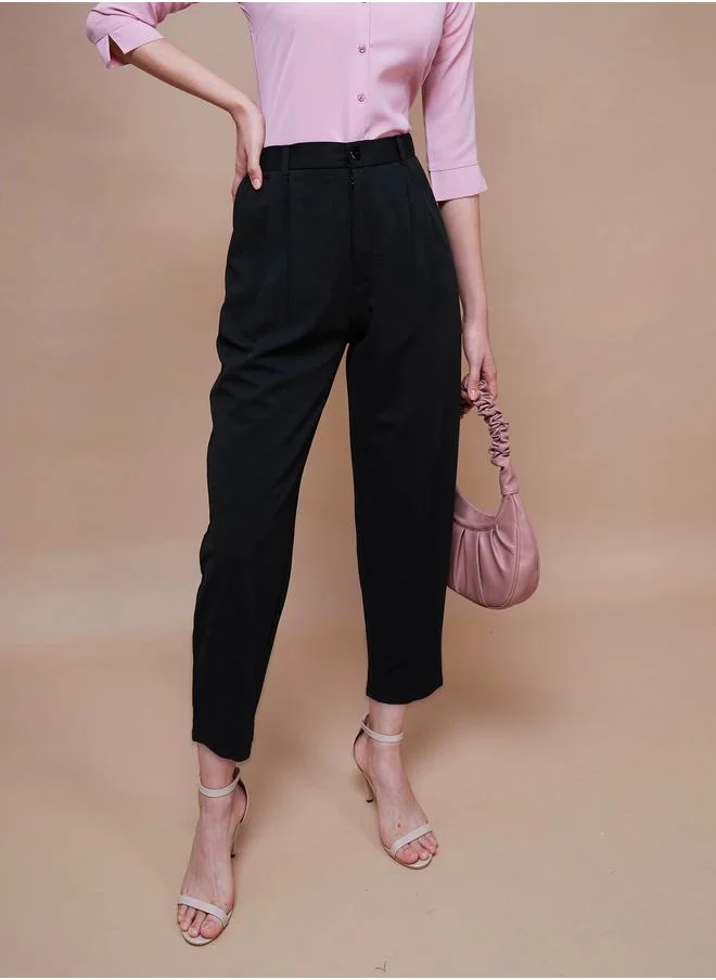 SASSAFRAS Pleated Detail Tapered Pants with Pockets