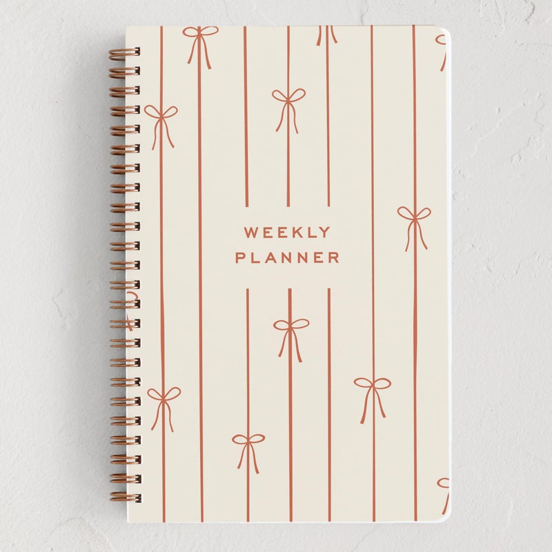 Minted Red Lines of Bows 2026 Weekly & Monthly Undated Planner, 5.5" x 8.5" Minimalist Spiral Bound Planner Notebook, 132 Pages, Elegant Red Pattern Undated Calendar Organizer - Image 1