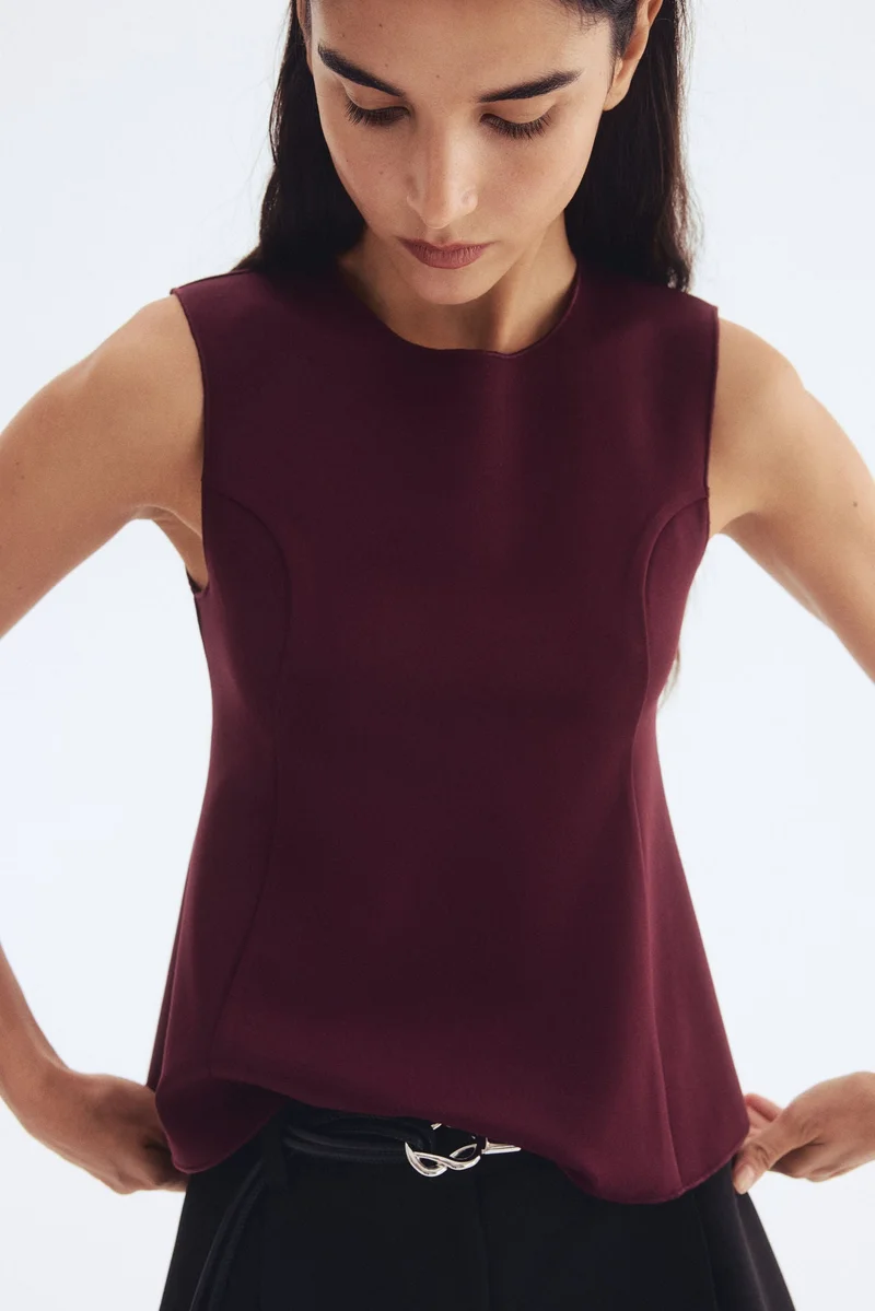 H&M Interlock peplum vest top