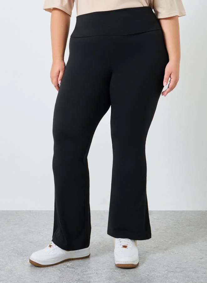 Styli Styli Women Plus Size Flared Black Leggings