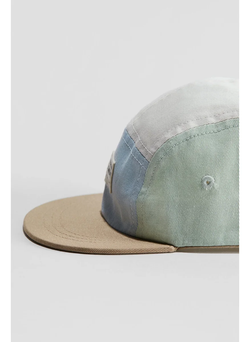 اتش اند ام Cap