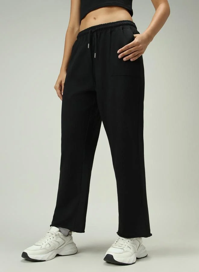 Outzidr  Black Patch Pocket Wide Leg Joggers for Women | Best Price UAE