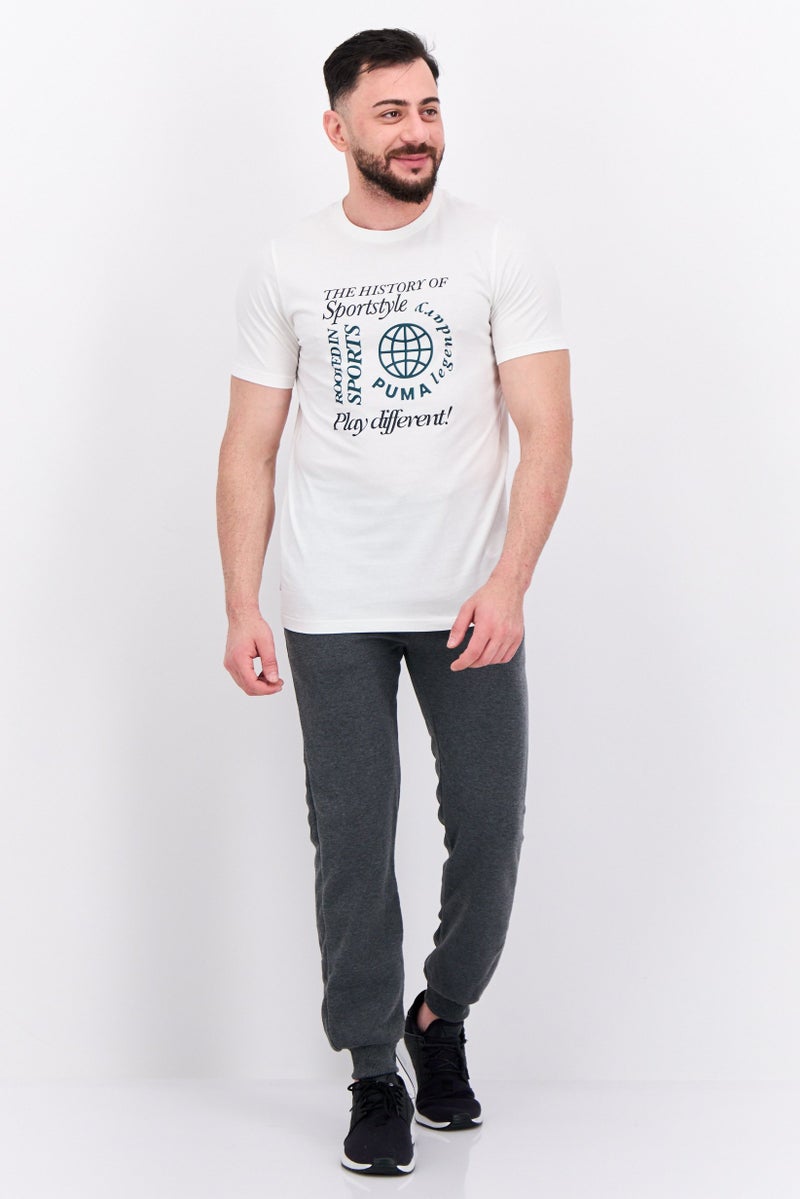 PUMA Men Sportswear Fit Graphic Print Short Sleeves Training T-Shirt, Warm White - Image 4