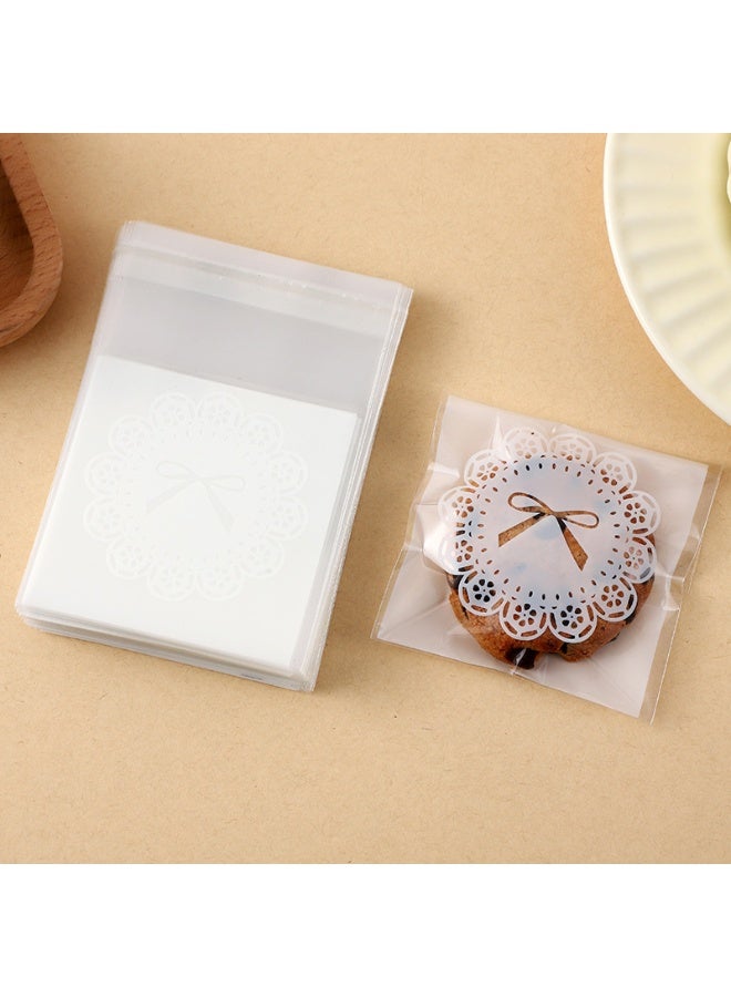 RTYY 200 كيس بسكويت ذاتي اللصق، أكياس بسكويت قابلة لإعادة الإغلاق على شكل فيونكة ندفة الثلج، أكياس بلاستيكية لخبز البسكويت والحلوى، أكياس بلاستيكية شفافة للحلويات، أكياس تغليف فردية للحلوى، أكياس سيلوفان لتغليف البسكويت والشوكولاتة والوجبات الخفيفة والمخبوزات (7x7 سم) - Image 2