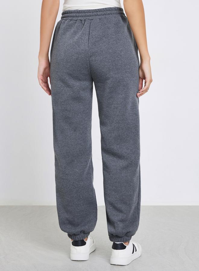 Styli Women Grey Solid Wide Leg Joggers with Drawstring Waist - Image 4