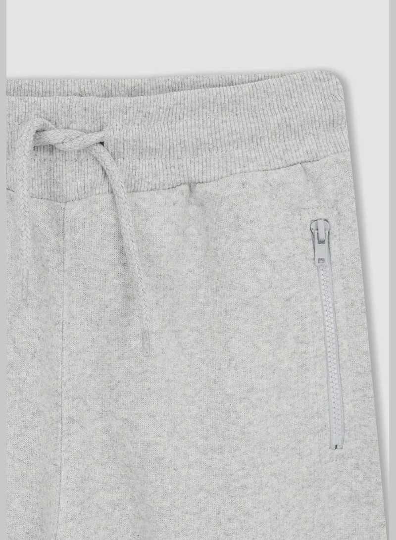 ديفاكتو Slim Fit Zippered Joggers