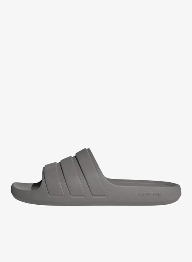 Adidas TAUOXI/TAUOXI/TAUOXI Adilette Flow Slides  | Best Price UAE