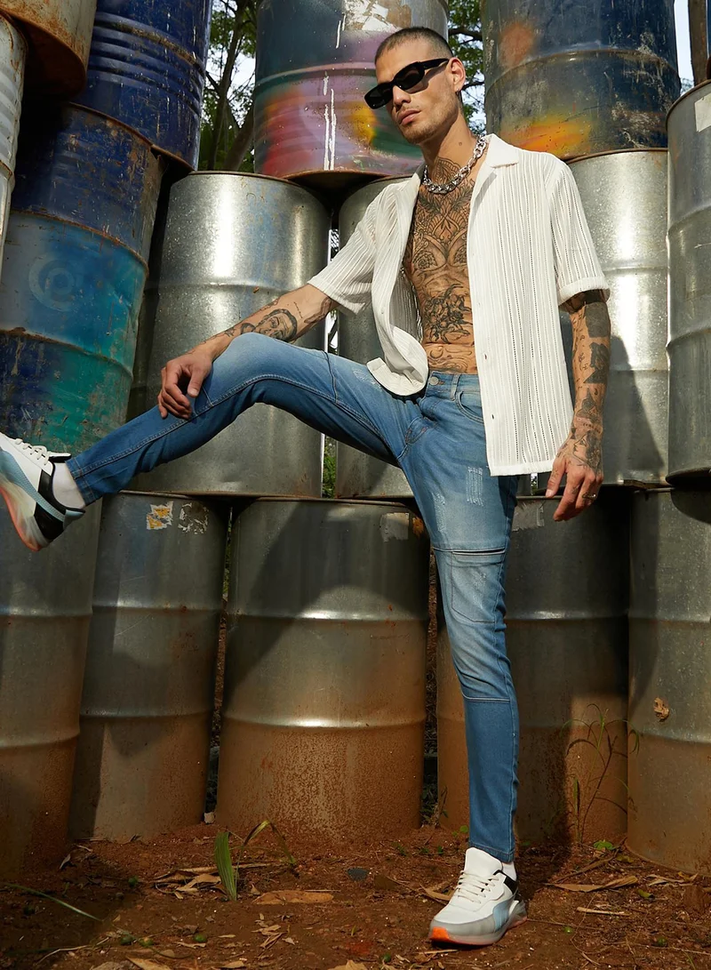 Campus Sutra  Men's Light Blue Self-Design Patched Denim Jeans for Men | Best Price UAE