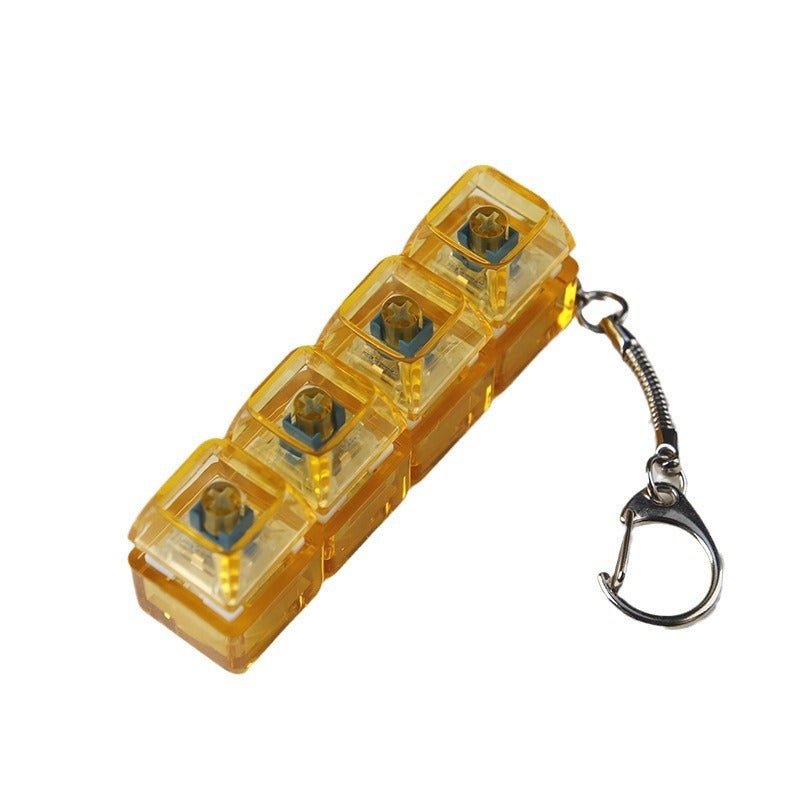 PC fully transparent material decompression shaft tester press sound crisp 2 holes 3 holes 4 holes key chain with light transparent cap 4-hole Orange transparent with light * 1 