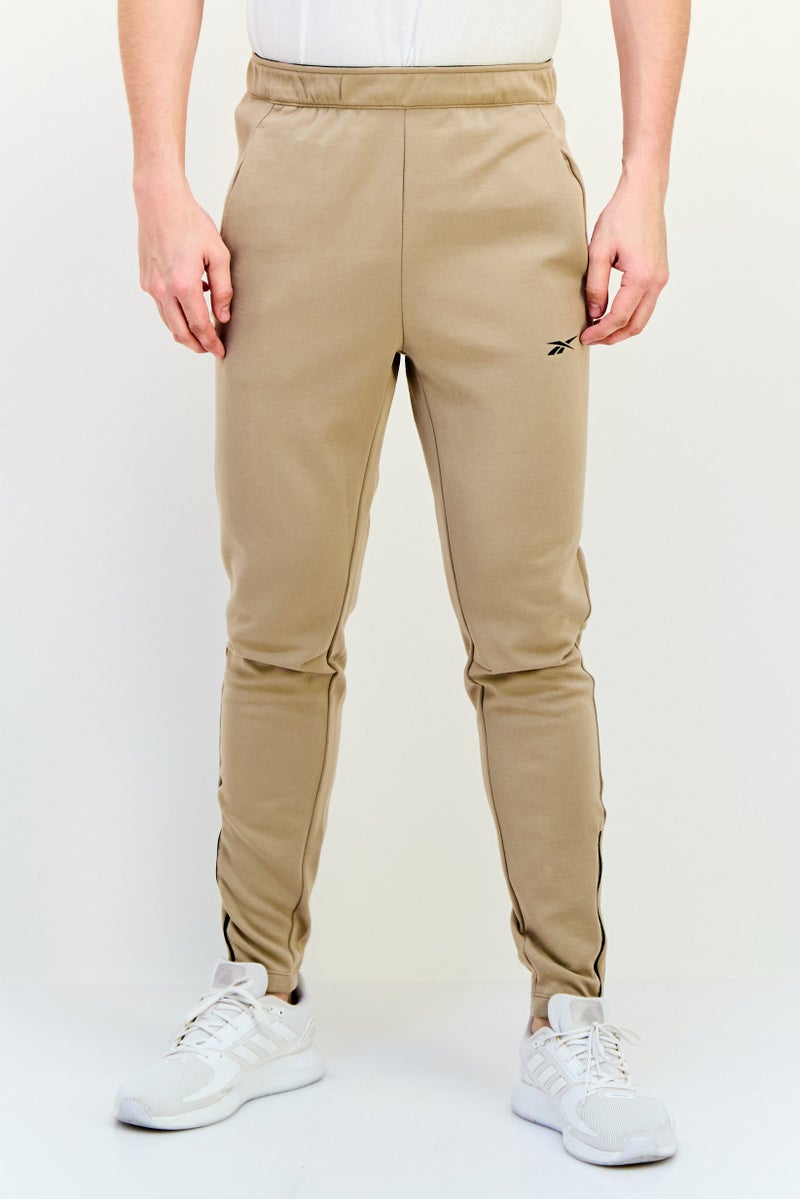 Reebok Men Sportswear Fit Drawstring Training Track Pants, Tan  - Image 1