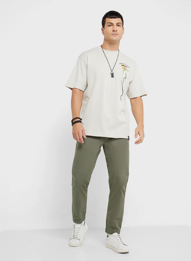 ريبلز مع نمشي MEN'S DROP SHOHULDER T-SHIRT