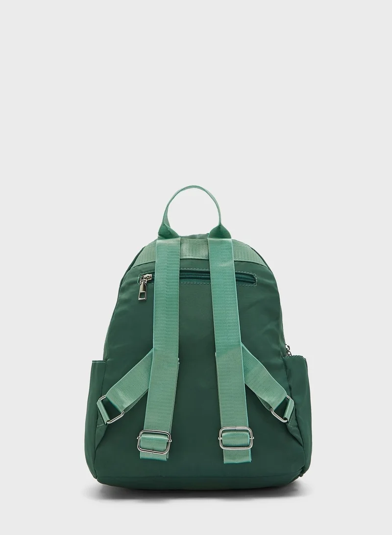 Ginger Quilted Multi Pocket Backpack