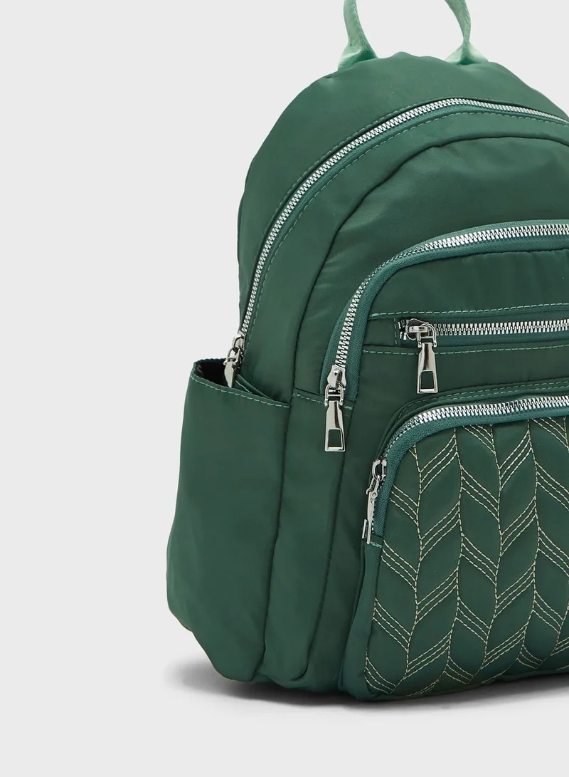 Ginger Quilted Multi Pocket Backpack