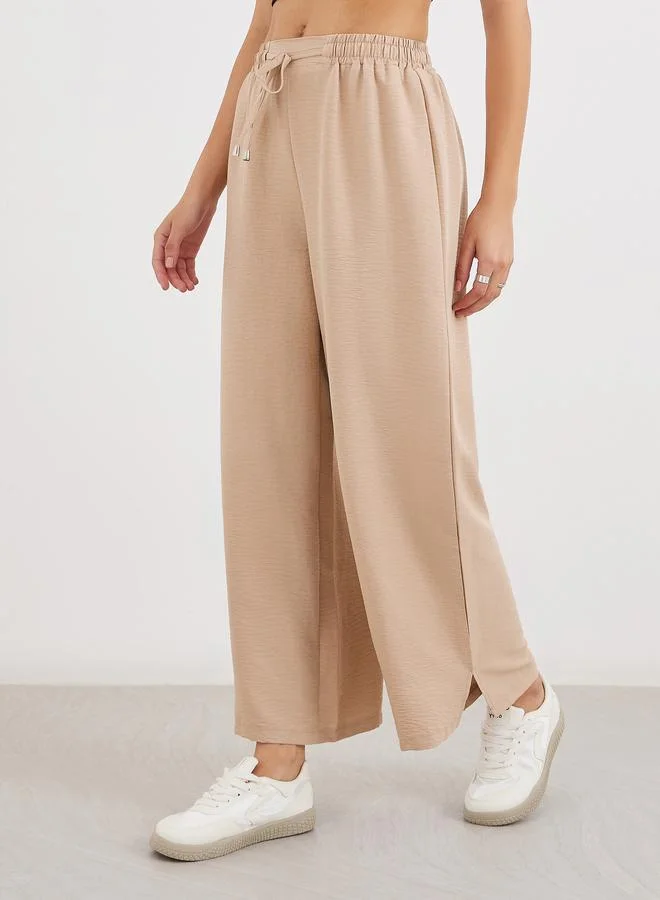 ستايلي Styli Solid Drawstring Waist Wide Leg Pants