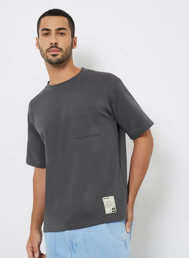 Styli Men Oversized Compact Stretch Heavy Jersey T-Shirt with Badge