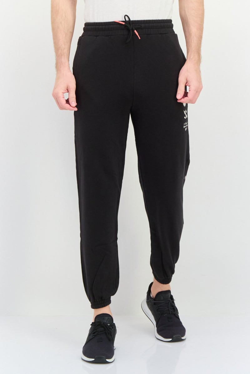 PUMA Puma x Staple Men Sportswear Fit Training Sweatpants, Black - Image 1