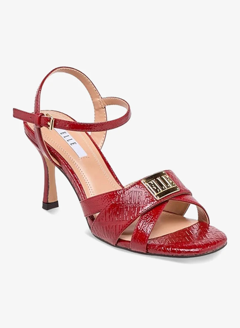 ايل صنادل نسائية بنقش شعار وكعب خنجر وإغلاق بإبزيم