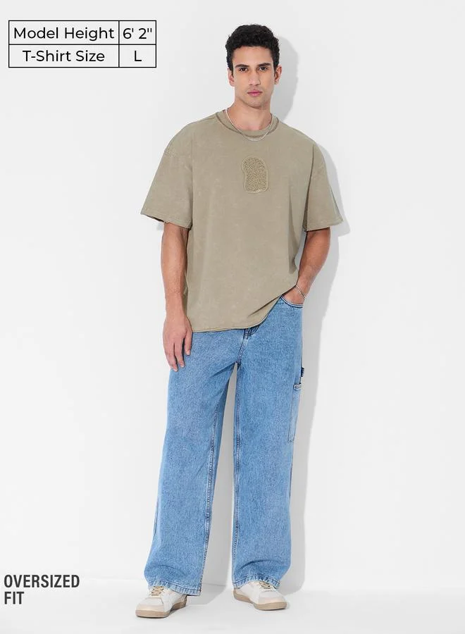 ذا سوليد ستور تيشيرت واسع بتفاصيل مشطوفة