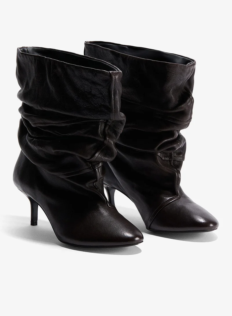 اتش اند ام بوت من الجلد بكعب