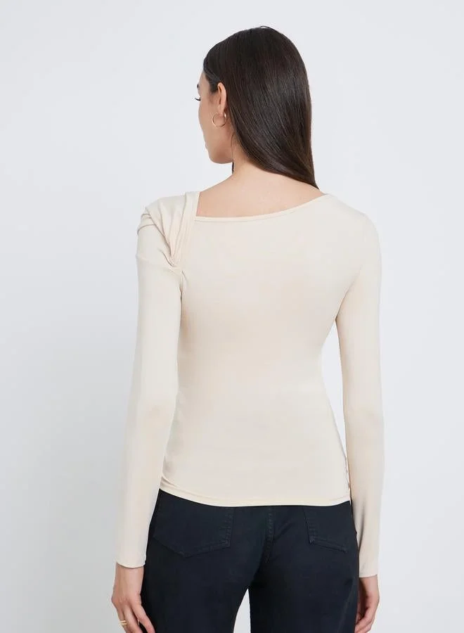 Styli Styli Beige Asymmetric Neck Top with Butterfly Metal