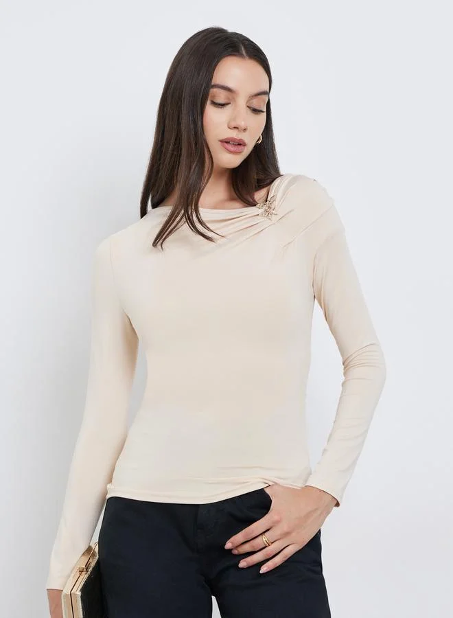 Styli Styli Beige Asymmetric Neck Top with Butterfly Metal