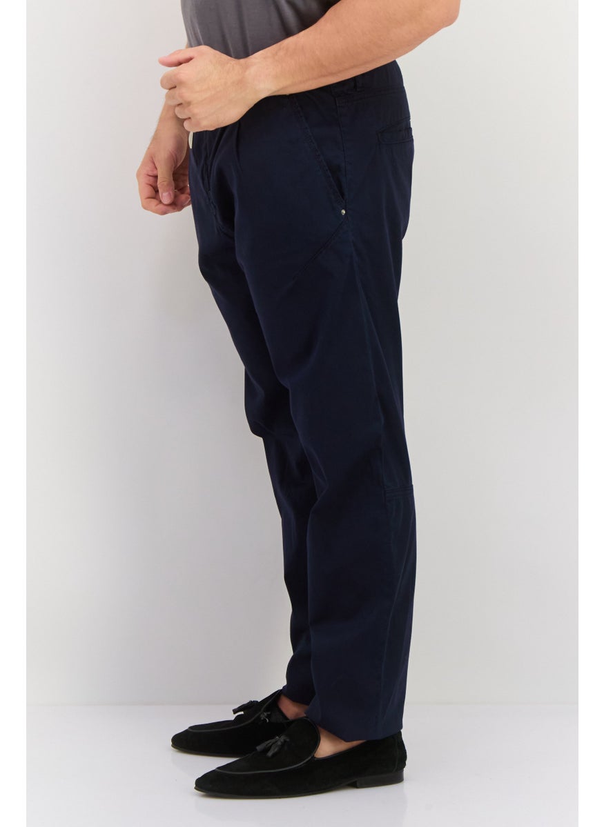 Men Carrot Stretch Plain Chino Pants, Navy - pzsku/Z799EBF885C8210E39039Z/45/_/1737641358/277bd73d-bc69-4730-8685-7ec0ae8092c9