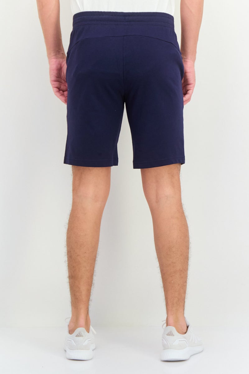PUMA شورتات خارجية ضيقة للرجال بشعار العلامة التجارية، أزرق داكن - Image 4