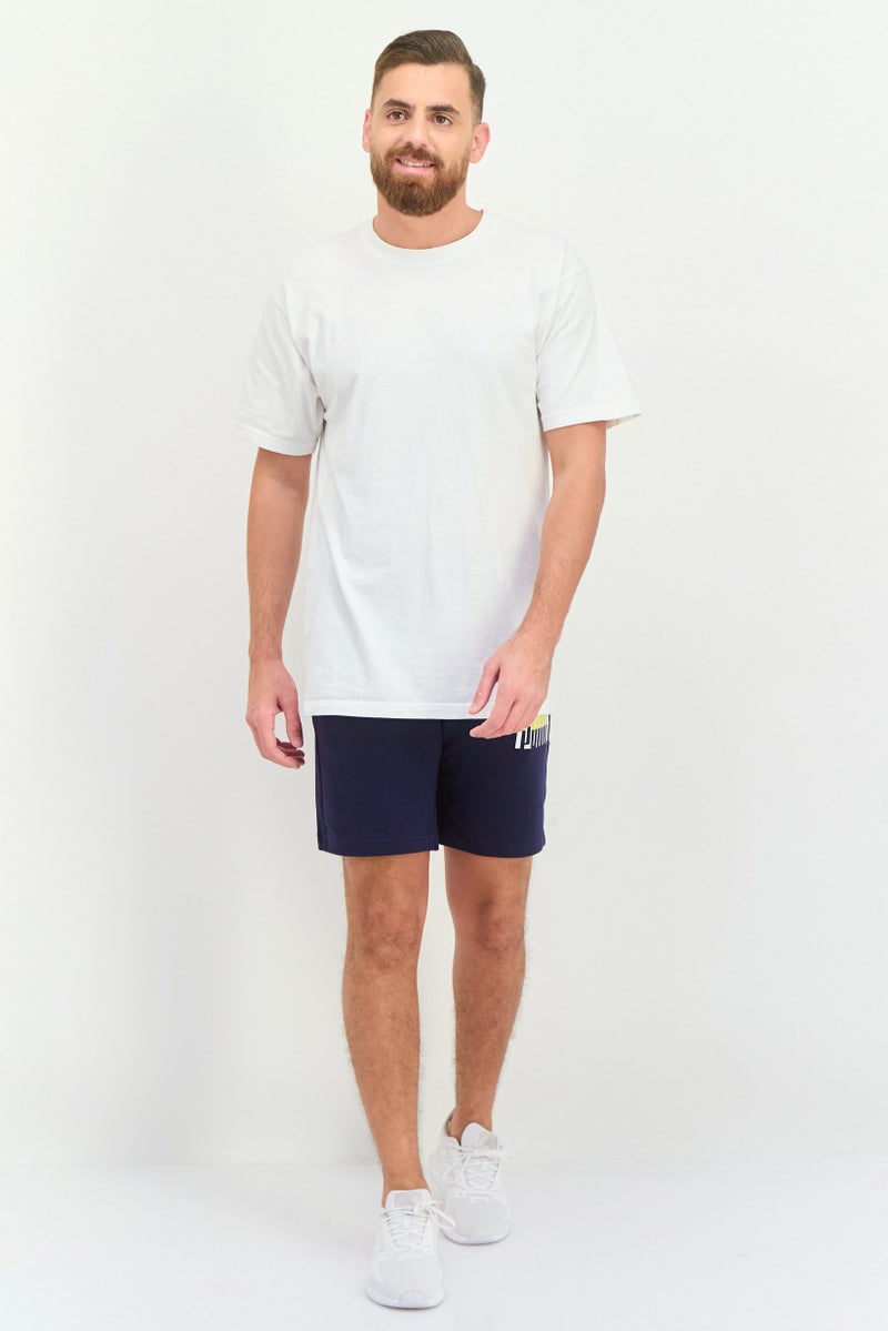 PUMA شورتات خارجية ضيقة للرجال بشعار العلامة التجارية، أزرق داكن - Image 2