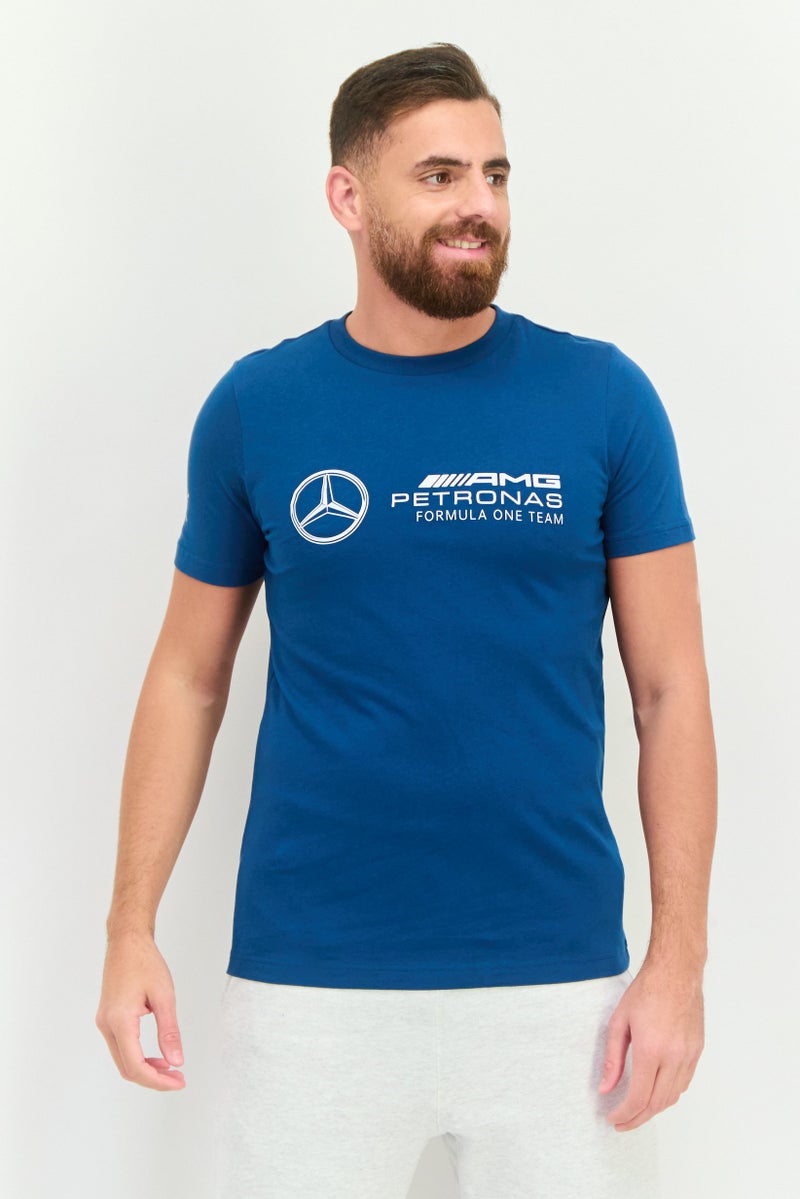 PUMA Men AMG Petronas Sportswear Fit Short Sleeves Outdoor T-shirt, Teal Blue - Image 1