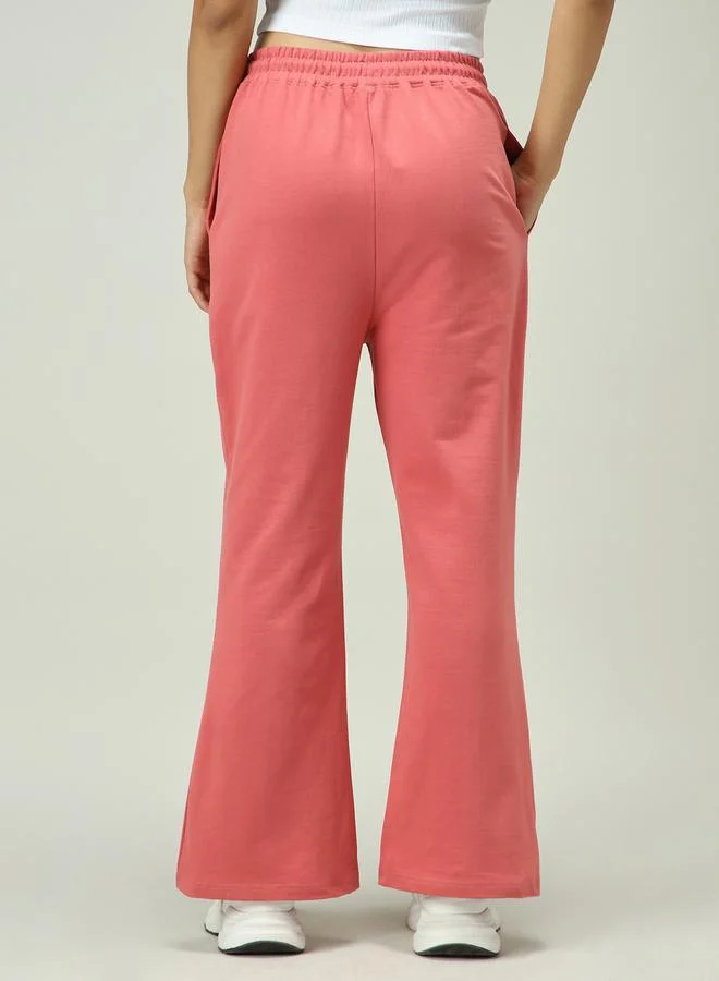 Outzidr  Pink Solid Pintuck Flared Joggers for Women | Best Price UAE