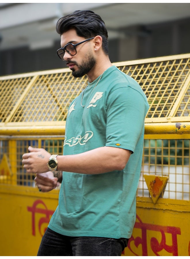 مانياك تيشيرت قطن رجالي بطباعة دائرية برقبة نصف كم بلون أخضر بيرلي وكريمي - Image 3