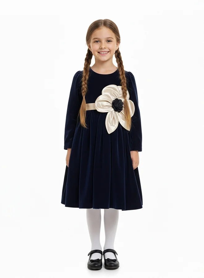 HAWRAA ABAYA Girls’ navy velvet dress with silky flower details – a luxurious design for special occasions