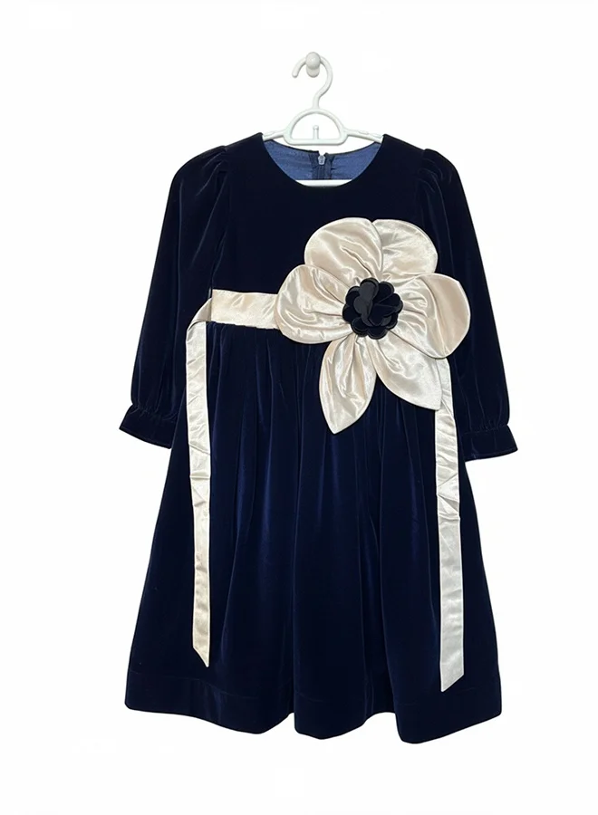 HAWRAA ABAYA Girls’ navy velvet dress with silky flower details – a luxurious design for special occasions