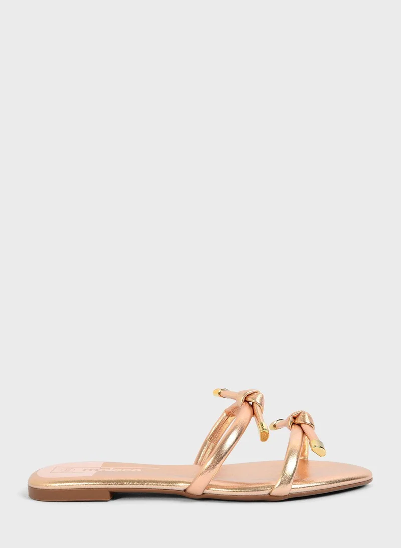 موليكا صنادل مسطحة بحزام عقدة